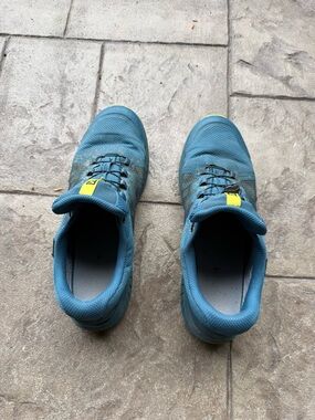Salomon Teal Athletic Trail Shoes with Yellow Pull Tabs